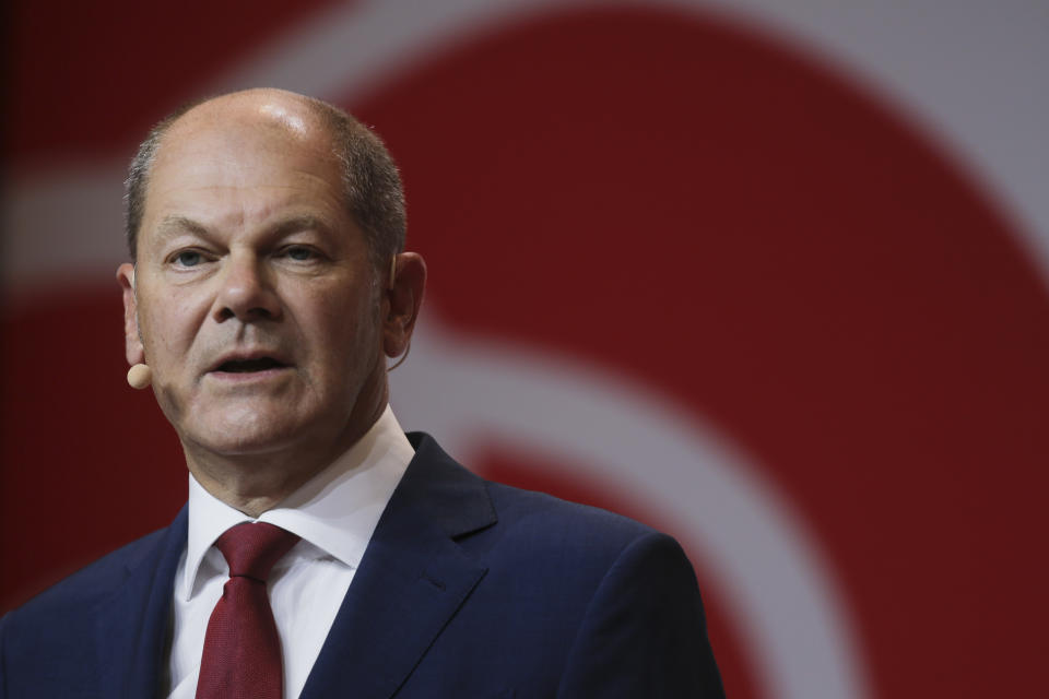 German Finance Minister Olaf Scholz attends a news conference in Berlin, Germany, Monday, Aug. 10, 2020. Olaf Scholz announces that he will run for the for the Social Democratic Party as chancellor candidate at next year's general elections in Germany.(AP Photo/Markus Schreiber)