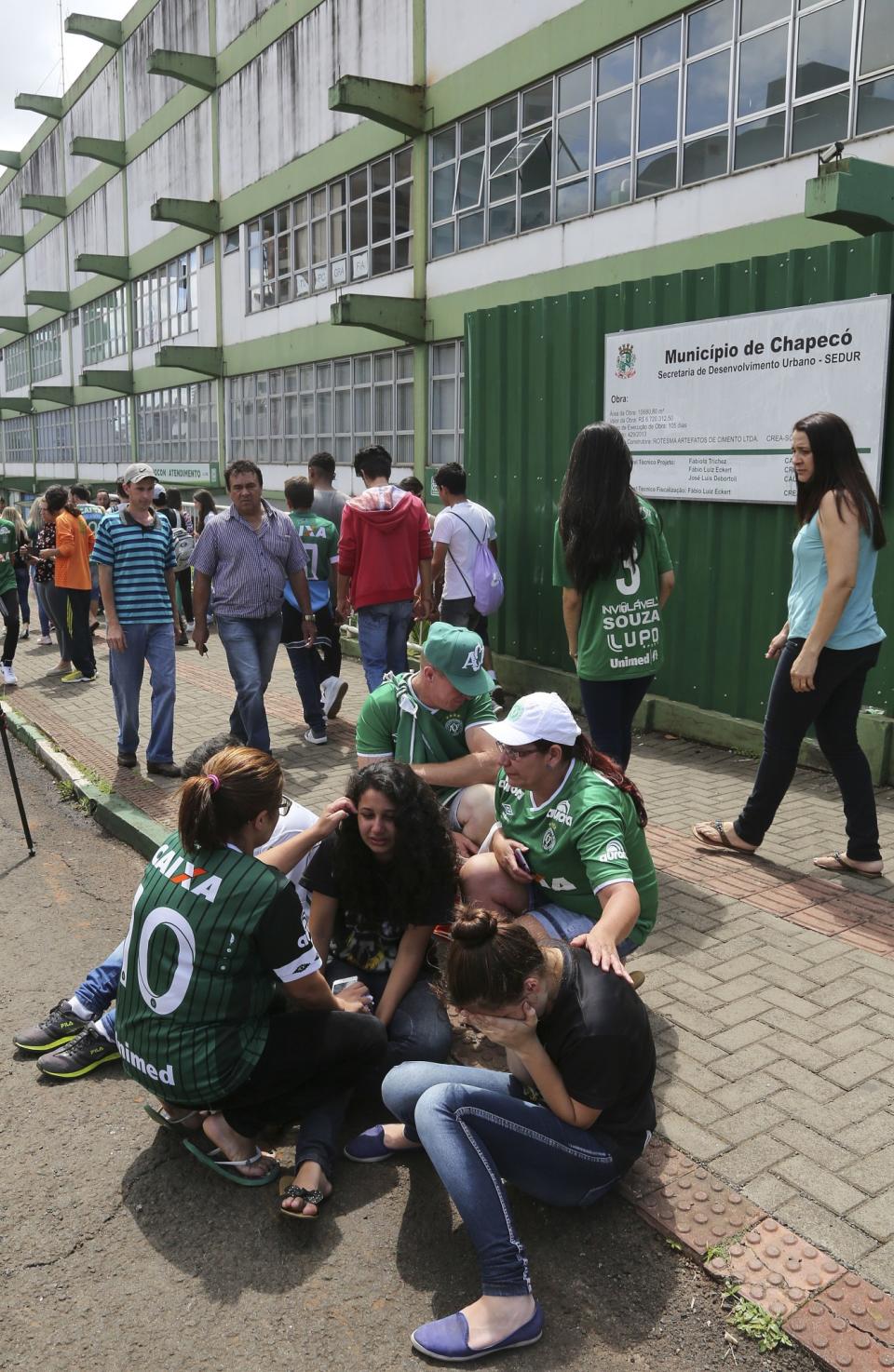 <p>Fans of Brazil’s soccer team Chapecoense gather at the Arena Conda stadium in Chapeco, Brazil, Tuesday, Nov. 29, 2016. A chartered plane that was carrying the Brazilian soccer team to the biggest match of its history crashed into a Colombian hillside and broke into pieces, killing 75 people and leaving six survivors, Colombian officials said Tuesday. (AP Photo/Andre Penner) </p>