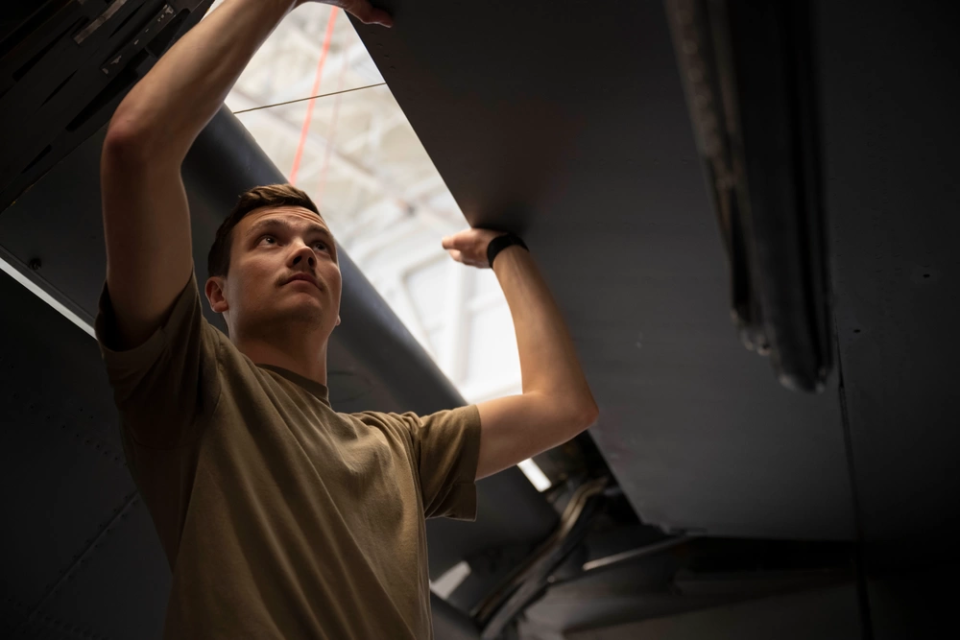 Staff Sgt. Jacob Alvarado, 22nd Maintenance Squadron repair and reclamation journeyman, works on an aircraft at McConnell Air Force Base, Kansas, March 12, 2024. Alvarado was a part of a volunteer team to fix 'Doc', a B-29 bomber. (U.S. Air Force photo by Airman Paula Arce)