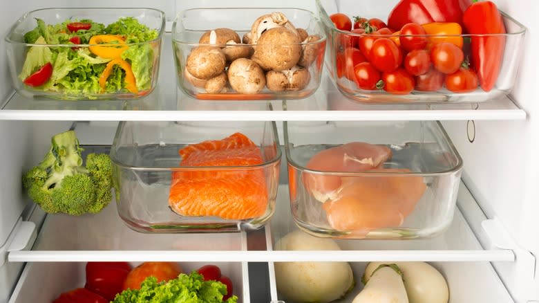 organized containers of food in fridge