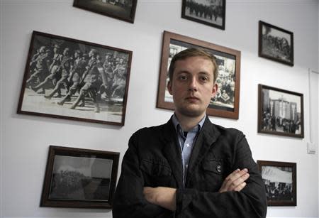 Ruch Narodowy's leader Robert Winnicki poses for a picture at an office in Warsaw July 12, 2013. Picture taken July 12, 2013. REUTERS/Kacper Pempel
