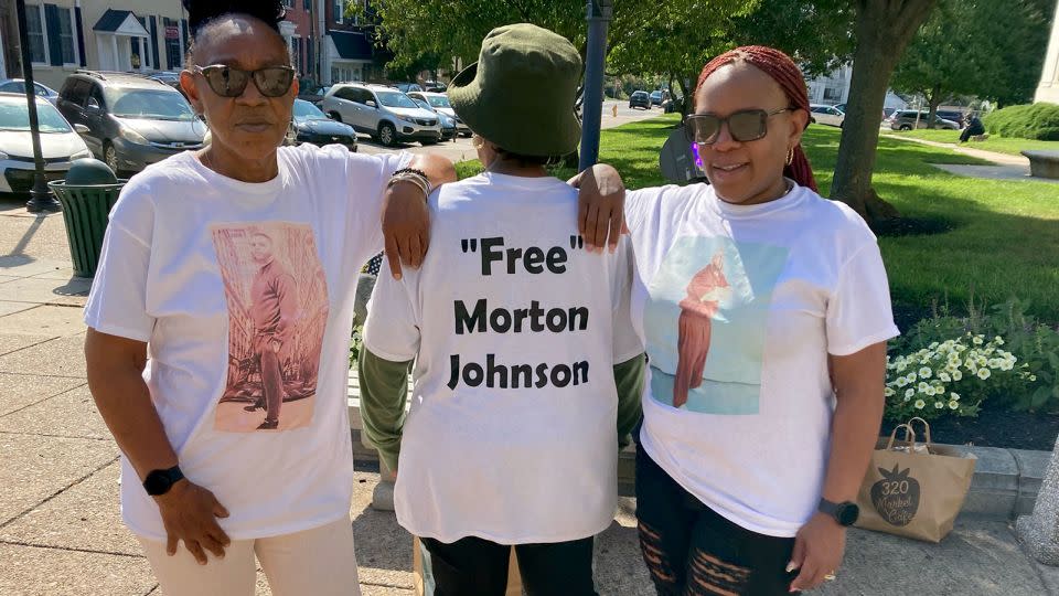 From left to right, Janet Purnell, Brenda Brown, and Kenyett LeBue showed their support for Morton Johnson. - Eric Levenson/CNN