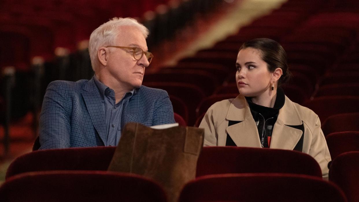  A press image of Steve Martin and Selena Gomez looking at each other while sitting in the Goosebury theater in Only Murders in the Building. 