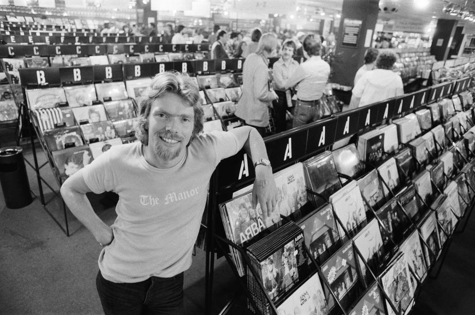 Richard Branson, 28 year old mastermind behind Virgin Music company. Seen here in his Virgin Mega Store Record Shop. In this set of 21 pictures , Richard is seen relaxing on his houseboat, going to work, in his recording studio The Townhouse in West London,, and in the brand new Virgin Mega Store with some of the £3,000,000 worth of records and tapes in the background.  Picture by Bill Rowntree  Picture taken 4th July 1979