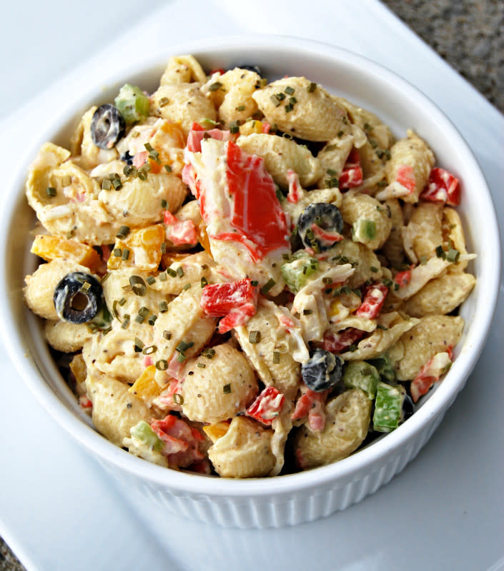 <p>Krista Marshall</p><p>Imitation crab is the secret to keeping this budget-friendly.</p><p><strong>Get the recipe:</strong> <strong><a href="https://parade.com/842643/kristamarshall/crab-pasta-salad/" rel="nofollow noopener" target="_blank" data-ylk="slk:Crab Pasta Salad;elm:context_link;itc:0;sec:content-canvas" class="link ">Crab Pasta Salad</a></strong></p>