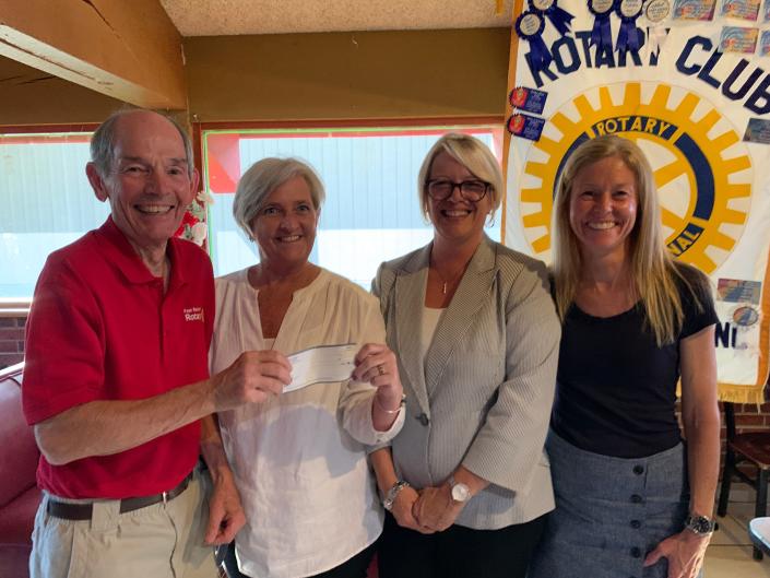 From left are Dick Miley (Four Seasons Rotary/Tour Co-Director), Debi Smith (TDA Board Chair 2021), Michelle Owens (TDA Executive Director) and Danielle McCall (TDA Grants Committee Chair).