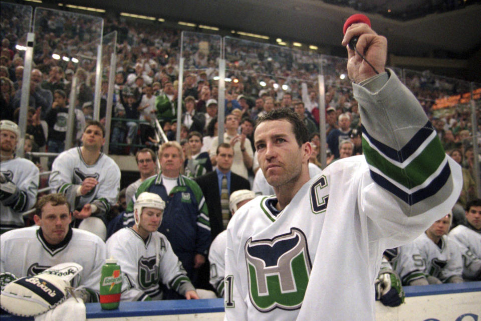 Hartford Whalers captain Kevin Dineen waves to the fans after the Whalers final NHL hockey game, Sunday, April 13, 1997, in Hartford, Conn., against the Tampa Bay Lightning. Connecticut Gov. Ned Lamont said Friday, May 19, 2023, he's planning to meet with NHL Commissioner Gary Bettman about the possibility of moving the Arizona Coyotes to Hartford. Connecticut has not had an NHL team since the Hartford Whalers left for North Carolina in 1997. (AP Photo/Steve Miller, File)