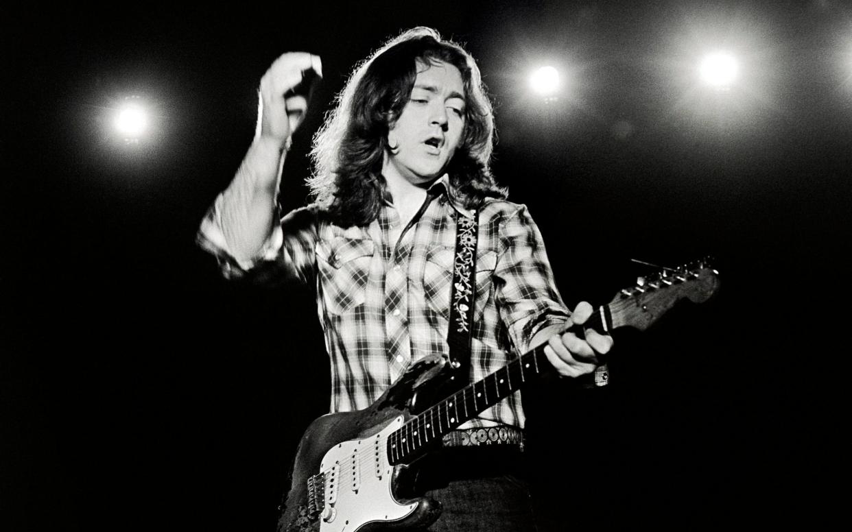 Rory Gallagher playing his Fender Stratocaster guitar in 1979 - Redferns