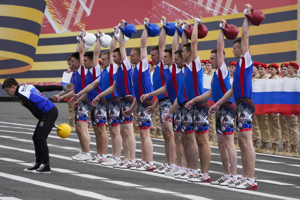 Military cadets demonstrate their skills during a rehearsal for the Victory Day military parade which will take place at Dvortsovaya (Palace) Square on May 9 to celebrate 78 years after the victory in World War II in St. Petersburg, Russia, Sunday, May 7, 2023. (AP Photo/Dmitri Lovetsky)