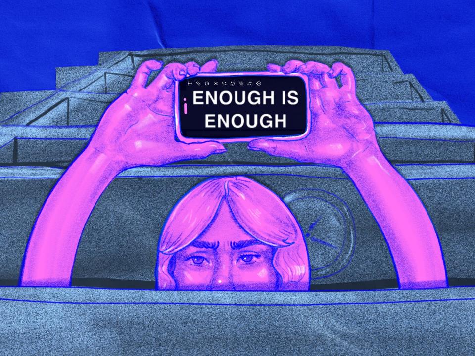 illustration of a bright pink gen z woman sitting in a gray cubicle holding up a cellphone screen that reads "enough is enough"
