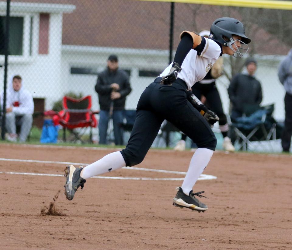 Corning's Atalyia Rijo heads toward second during a 12-4 win over Elmira in softball April 21, 2022 at Corning-Painted Post High School.