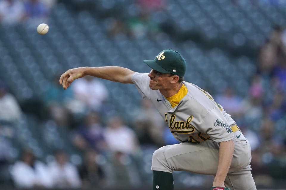 Oakland Athletics starting pitcher Chris Bassitt throws to a Seattle Mariners batter during the first inning of a baseball game Tuesday, June 1, 2021, in Seattle. (AP Photo/Ted S. Warren)