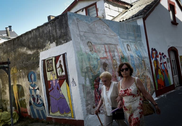 Dilapidated, single-storey houses still remain in the town, but several new homes have started to crop up