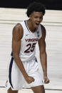 Virginia's Trey Murphy III celebrates after making a basket and being fouled in the second half of an NCAA college basketball game against Towson, Wednesday, Nov. 25, 2020, in Uncasville, Conn. (AP Photo/Jessica Hill)