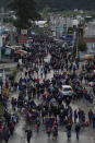 People block the Inter American Highway during a nationwide strike in Totonicapan, Guatemala, early Thursday, July 29, 2021. People are calling for the resignation of Guatemalan President Alejandro Giammattei and Attorney General Consuelo Porras after they fired Special Prosecutor Against Impunity Juan Francisco Sandoval. (AP Photo/Moises Castillo)