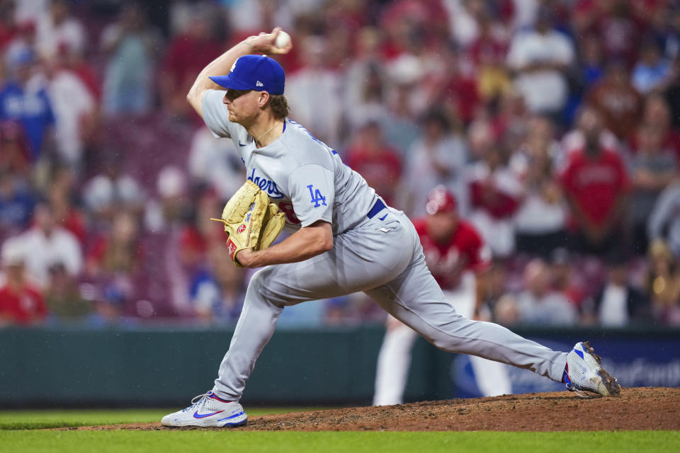 Los Angeles Dodgers' Shelby Miller throws during the ninth inning of the team's baseball game against the Cincinnati Reds in Cincinnati, Tuesday, June 6, 2023. (AP Photo/Aaron Doster)