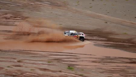 Dakar Rally - 2017 Paraguay-Bolivia-Argentina Dakar rally - 39th Dakar Edition - Fifth stage from Tupiza to Oruro, Bolivia 06/01/17. Stephane Peterhansel of France drives his Peugeot with his copilot Jean Paul Ottret. REUTERS/Ricardo Moraes