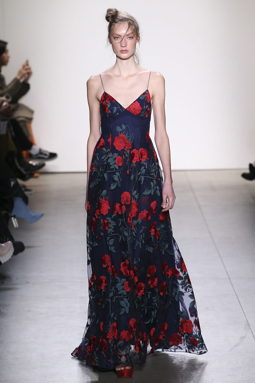 <p>A rich, floral-embroidered spaghetti-strap dress at Adam Selman (Photo: Getty Images) </p>