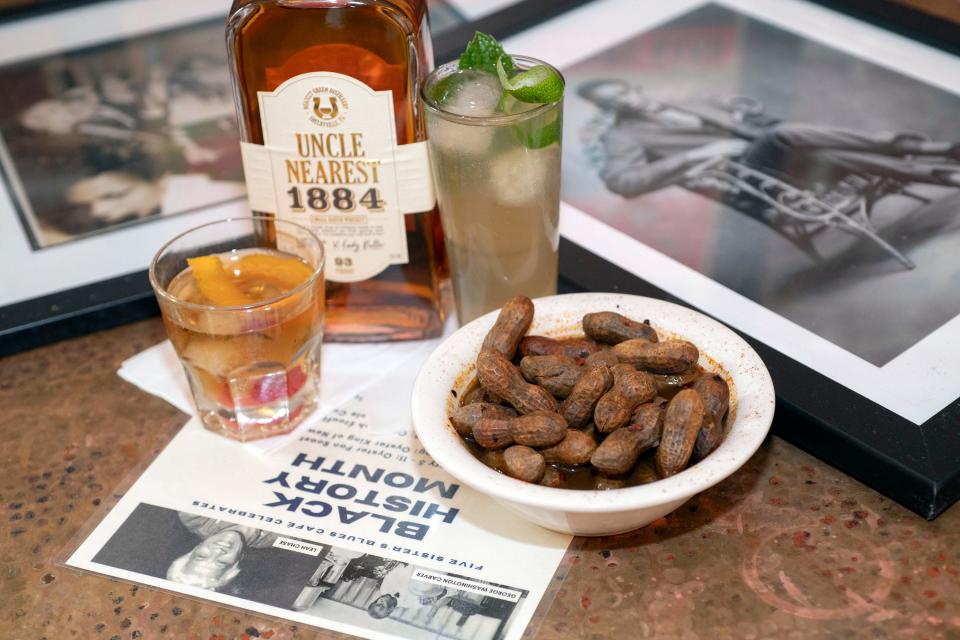 Downtown's Five Sisters restaurant has created a special menu to honor Black History Month. The menu features weekly food and drink specials inspired by African-American food pioneers and icons like this Uncle Nearest's 1884 Old Fashioned and boiled peanuts.