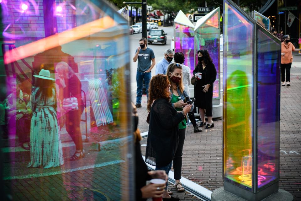 Spectators check out the Prismatica light display in Fayetteville in 2020.