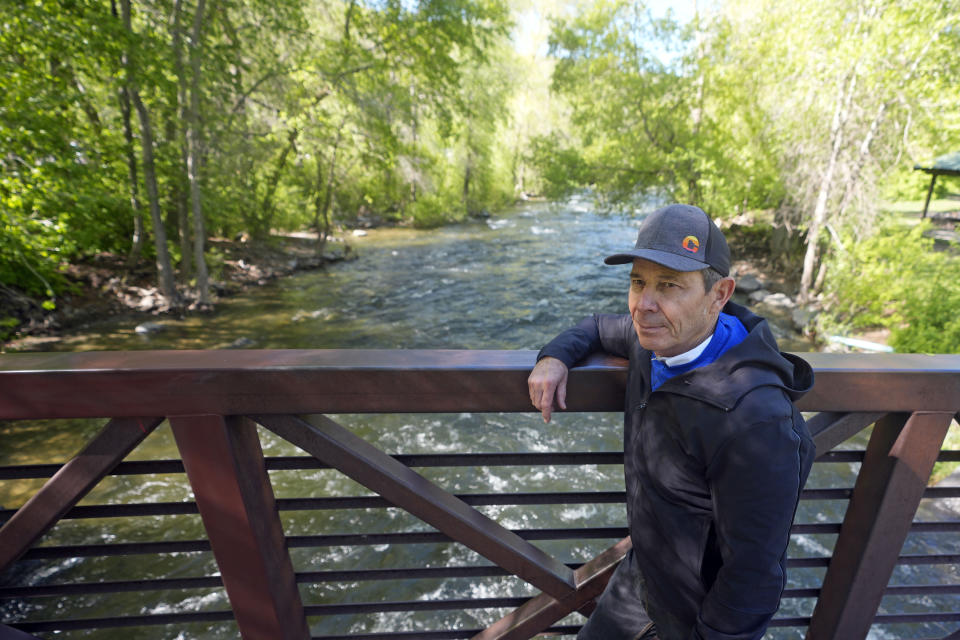 U.S. Rep. John Curtis hikes along the Provo Canyon Trail during a hike with constituents on May 11, 2024, in Orem, Utah. Curtis is looking to carve out his own brand of conservatism in the post-Romney era of Utah politics, with a focus on bringing Republicans to the table on issues involving climate change. (AP Photo/Rick Bowmer)