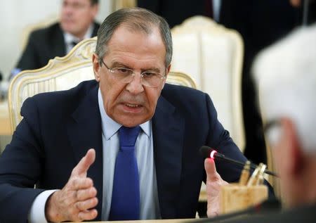 Russia's Foreign Minister Sergei Lavrov talks with his German counterpart Frank-Walter Steinmeier during their meeting in Moscow, November 18, 2014. REUTERS/Sergei Karpukhin