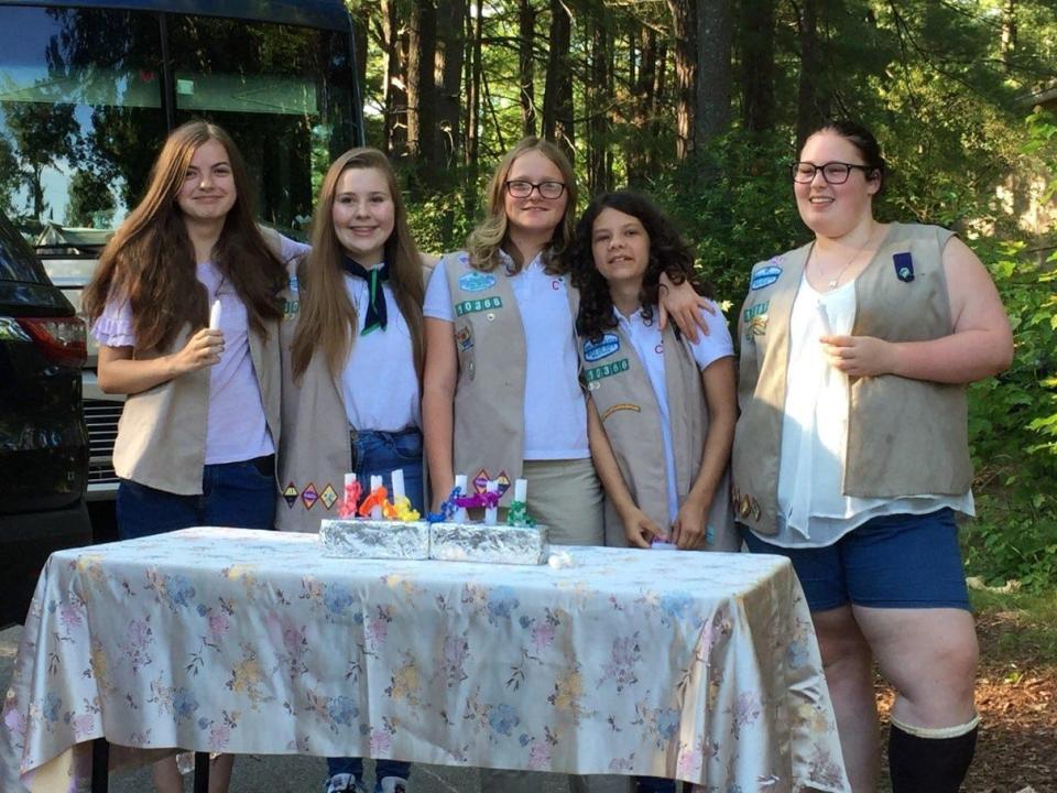 Girl Scout Volunteer of the Month Michelle Elefson leads a group of Girl Scouts who’ve been in her troop for many yeras. Here, Shaelyn Senter, Nikkia Henderson, Alonnah Marsolais, Allison Roach, and Alexis Zelano celebrate their bridging to the Girl Scout Senior level a few years ago.