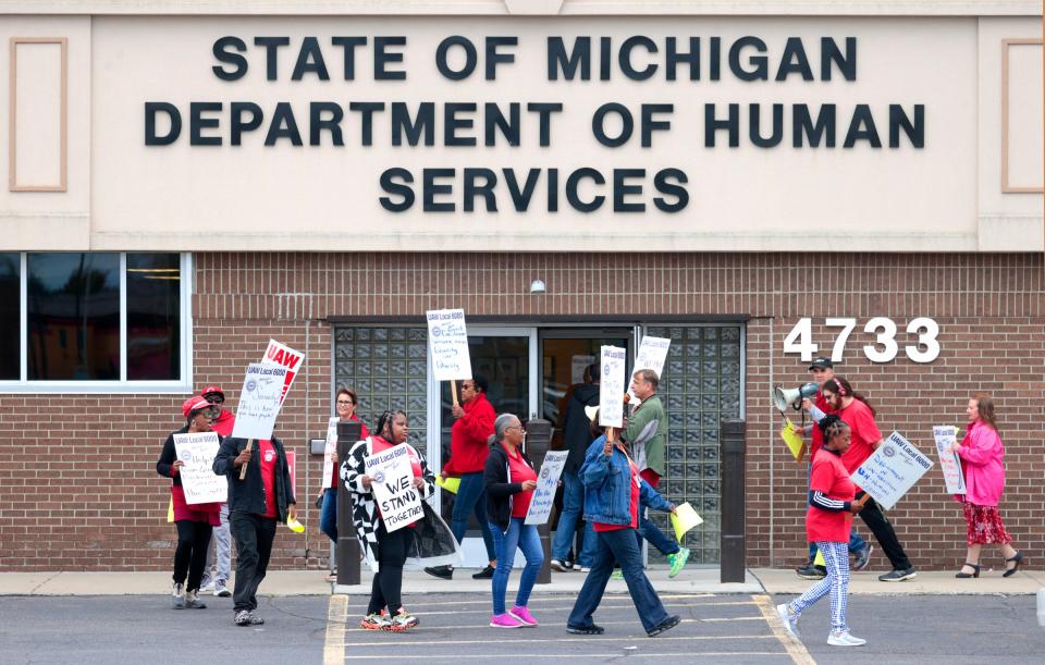 Some of the forty Michigan Department of Health & Human Services workers picketed in front of the DHHS office on Conner Avenue in Detroit on Wednesday, September 27, 2023. They were participating in an Informational Picket to bring more attention to their caseloads that are out of control and workers being overworked.