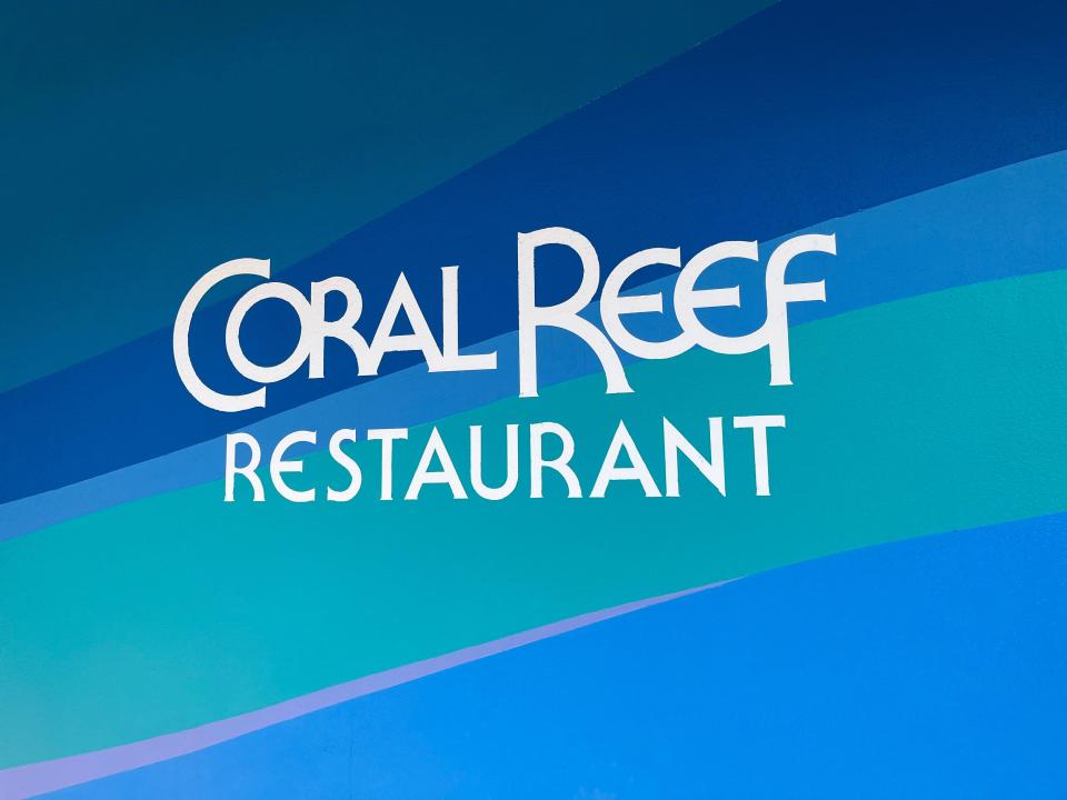 entrance sign for coral reef restaurant in epcot at disney world