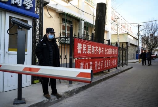 Measures such as face masks and temperature checks have been implemented in Beijing to help control the spread of the virus