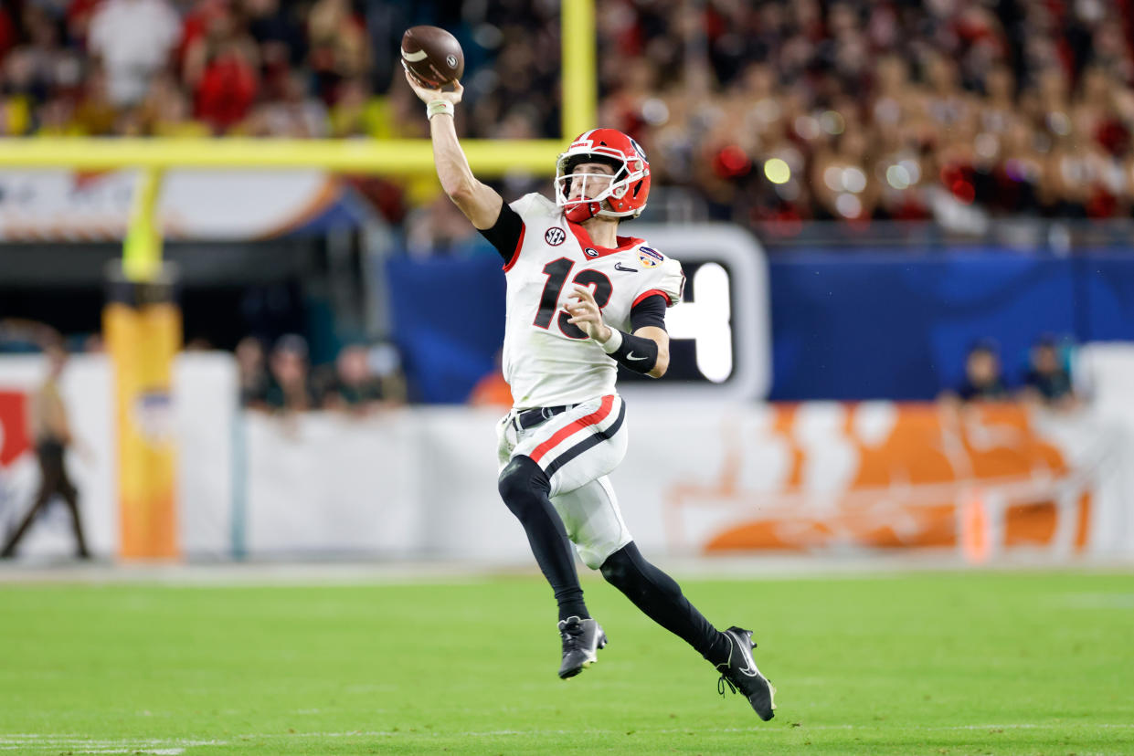 MIAMI GARDENS, FL - DECEMBER 31: Georgia Bulldogs quarterback Stetson Bennett (13) during the Capital One Orange Bowl game between the Georgia Bulldogs and the Michigan Wolverines on December 31, 2021 at Hard Rock Stadium in Miami Gardens, Fl.  (Photo by David Rosenblum/Icon Sportswire via Getty Images)