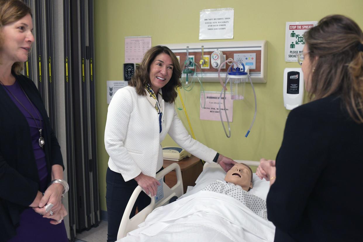 Lt. Gov. Karyn Polito, center, visits the Quinsigamond Community College Healthcare and Workforce Development Center Tuesday. At left is Labor and Workforce Development Sec. Rosalin Acosta and at right, Shanan Stratia, asst. dean, Quinsigamond Community College.