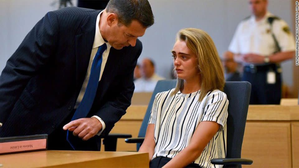 Attorney Joseph Cataldo talks to his client, Michelle Carter, on Monday.