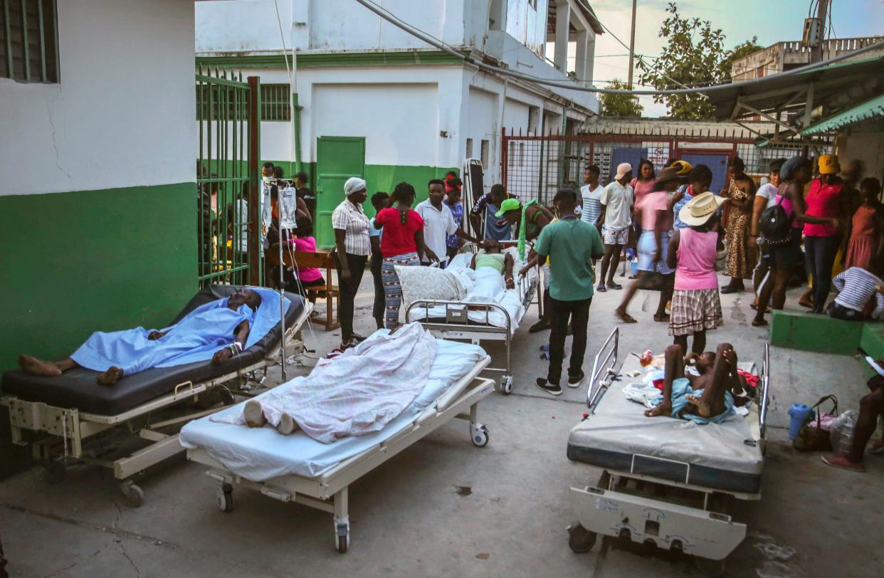 People injured during the earthquake are treated in the hospital in Les Cayes, Haiti, Sunday, Aug. 15, 2021.