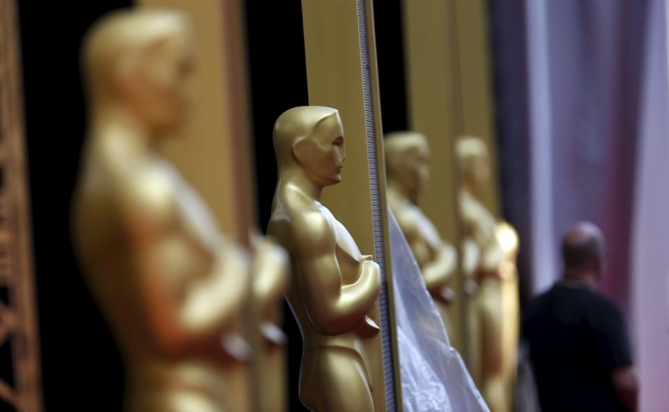 Oscar statues are pictured on the red carpet at the Dolby Theater during preparations leading up to the 88th Academy Awards in Hollywood, California, February 27, 2016. REUTERS/Mario Anzuoni