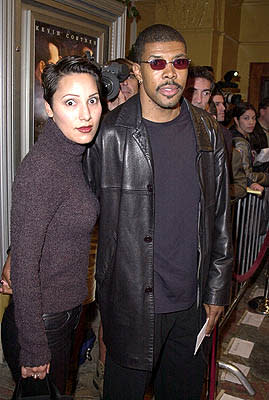 Eriq La Salle and bug-eyed girl at the Westwood premiere of New Line's Thirteen Days