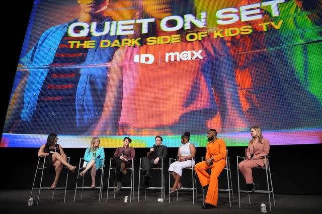 <p>Gonzalo Marroquin/Getty</p> Scaachi Koul, Mary Robertson, Emma Schwartz, Drake Bell, Giovonnie Samuels, Bryan Hearne and Kate Taylor speak onstage during the "Quiet On Set: The Dark Side of Kids TV" For Your Consideration event on April 09, 2024 in North Hollywood, California.