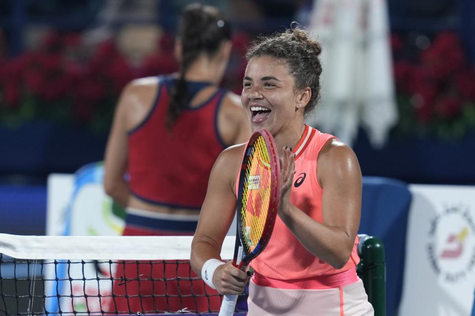 Jasmine Paolini of Italy celebrates after beating Solana Cirstea of Romania during a semi final match of the Dubai Duty Free Tennis Championships in Dubai, United Arab Emirates, Friday, Feb. 23, 2024. (AP Photo/Kamran Jebreili)