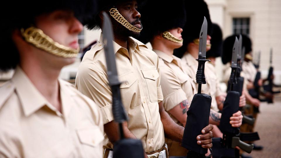 Members of the British Army's F Company Scots Guards take part in a rehearsal for a special Changing of the Guard ceremony, at Wellington Barracks in London on April 5, 2024, ahead of the 120th anniversary of the Entente Cordiale.