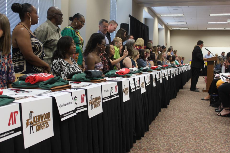 The first class of teacher residents in the Early Learning Teacher Residency program — a partnership between Austin Peay State University and the Clarksville-Montgomery County School System — prepare to sign their teaching contracts at a 'Signing Day' event on May 24, 2019.