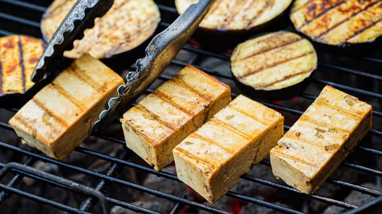 Firm tofu chunks on grill