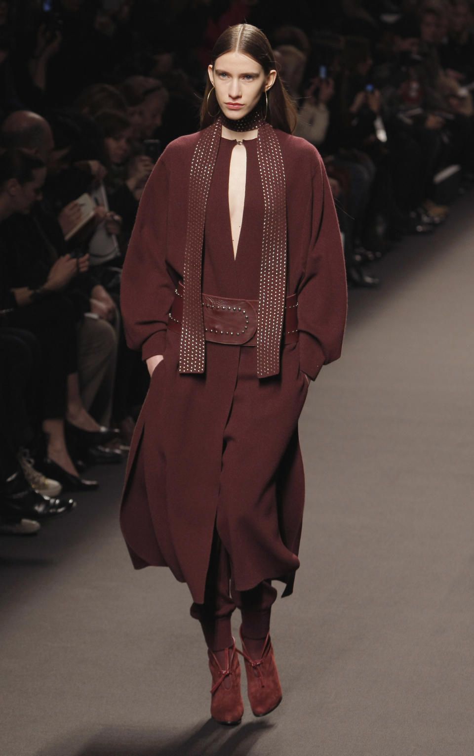 A model wears a creation from designer Allude as part of the Fall-Winter, ready-to-wear 2013 fashion collection, during Paris Fashion week, Wednesday, March 7, 2012. (AP Photo/Thibault Camus)