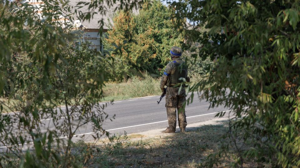 An armed Ukrainian soldier stands on the street on September 10, 2024 in Sudzha, Kursk Region, Russia. - Oleg Palchyk/Global Images Ukraine/Getty Images