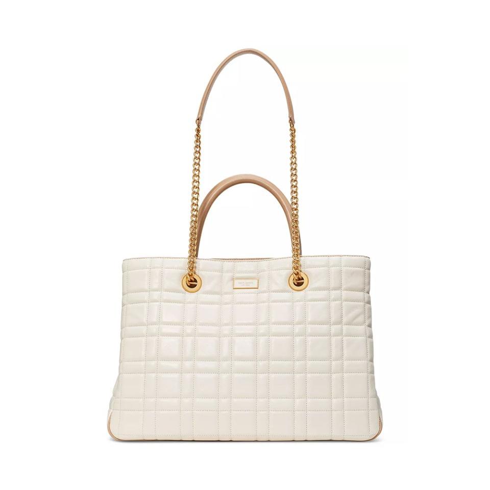 <p><a href="https://go.redirectingat.com?id=74968X1596630&url=https%3A%2F%2Fwww.katespade.com%2Fproducts%2Fevelyn-quilted-medium-convertible-shopper-bag%2FK9932.html&sref=https%3A%2F%2Fwww.elle.com%2Ffashion%2Fshopping%2Fg44640132%2Fbest-quilted-tote-bags%2F" rel="nofollow noopener" target="_blank" data-ylk="slk:Shop Now;elm:context_link;itc:0;sec:content-canvas" class="link ">Shop Now</a></p><p>Evelyn Quilted Medium Convertible Shopper Bag</p><p>$498.00</p><p>katespade.com</p><span class="copyright">Courtesy</span>