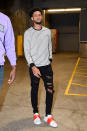 <p>The Grizzlies’ Tyler Dorsey wears a G.F.C. striped long sleeve and Philipp Plein studded spray paint sneakers while heading into the STAPLES Center on March 31. </p>
