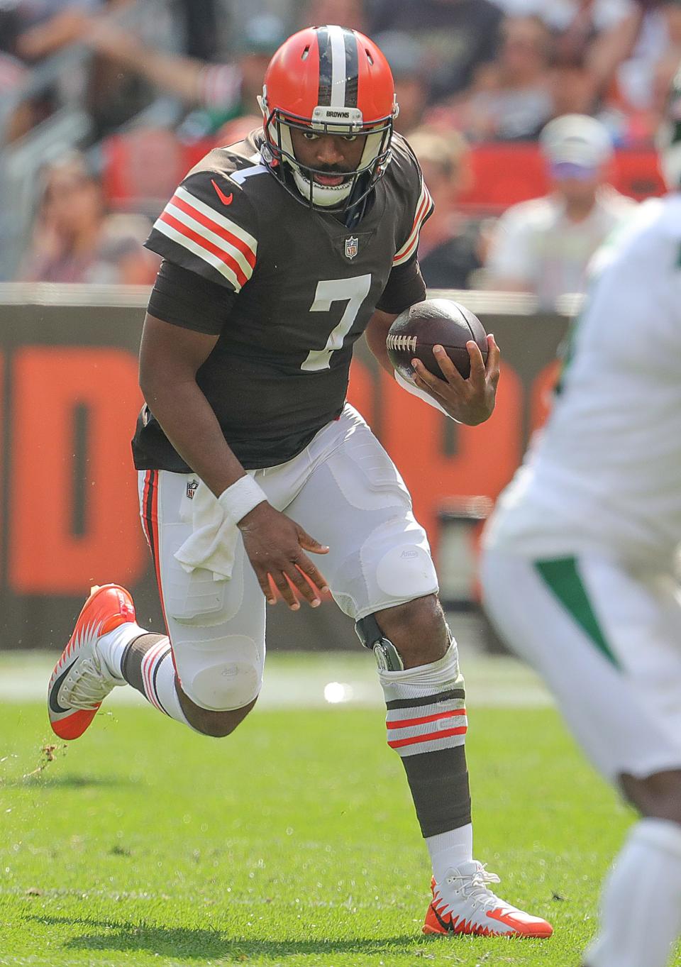 Browns quarterback Jacoby Brissett scrambles out of the pocket during the fourth quarter against the New York Jets, Sunday, Sept. 18, 2022 in Cleveland.
