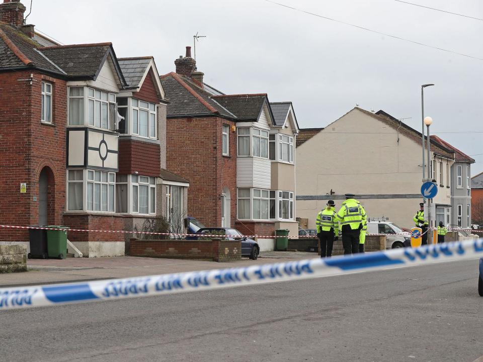 Police at the scene where two women were shot dead at a house in St Leonards, East Sussex: Gareth Fuller/PA Wire