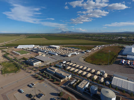 A tent city set up to hold immigrant children separated from their parents or who crossed the U.S. border on their own is seen in Tornillo, Texas, U.S., in this U.S. Department of Health and Human Services (HHS) image released on October 12, 2018. Courtesy HHS/Handout via REUTERS