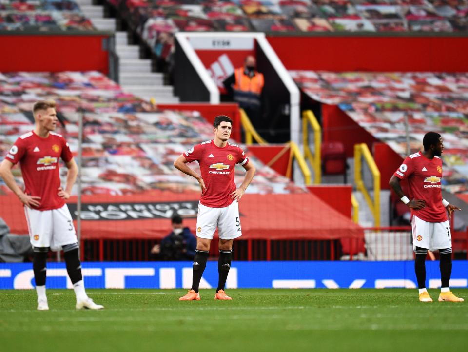 Manchester United players watch on during Tottenham defeatGetty Images