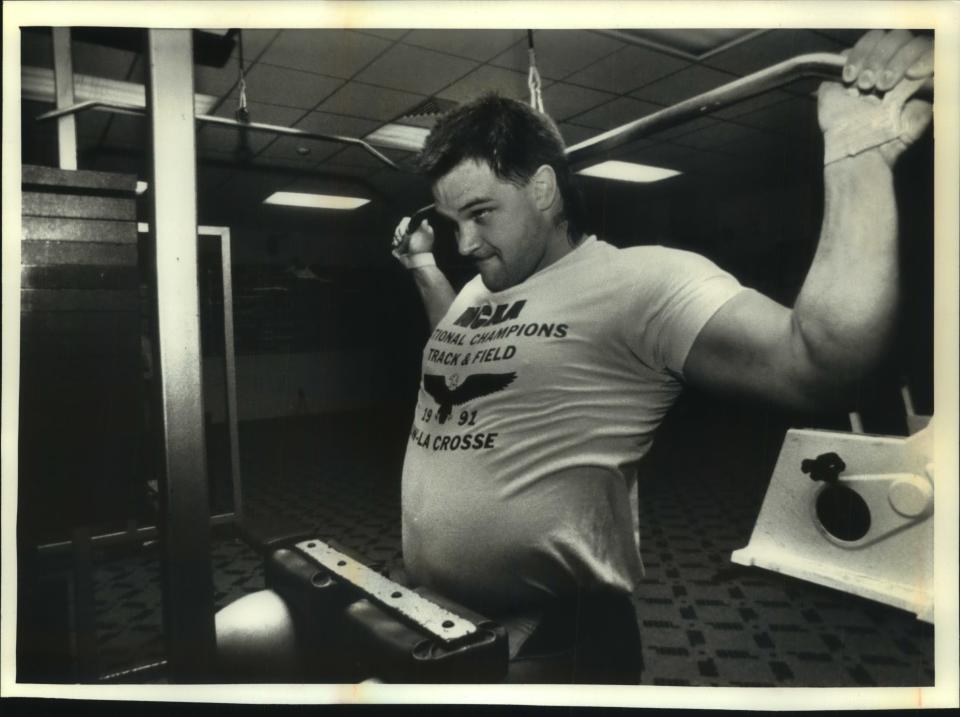 Olympic shot put hopeful Terry Strouf works out to strengthen his 6-foot-3, 290-pound body in 1992.